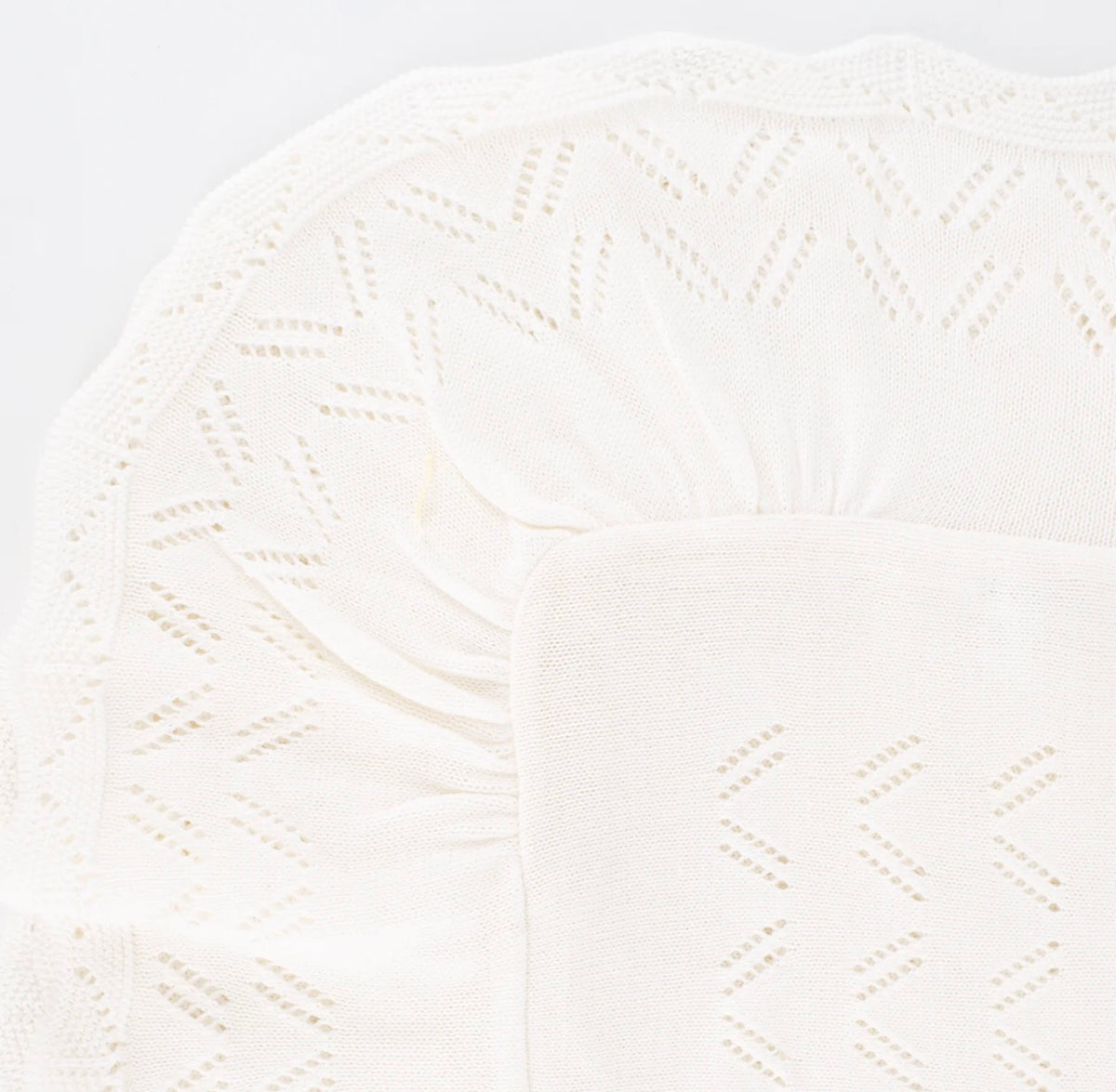 Ivory knit baby blanket